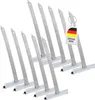 A set of ten metal roller shutter suspension springs, arranged in a staggered formation against a white background. A small tag with the German flag and the text 'DEUTSCHE MARKT' is attached to one of the springs. Anteprima dell’immagine prodotto