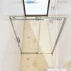 A modern shower enclosure with sliding glass doors, installed in a bathroom with tiled walls and a marble-patterned floor. A skylight is visible above. Produktbild-Vorschau