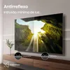 A television screen displaying a waterfall scene, with text and icons highlighting anti-reflection features. Voir les images du produit
