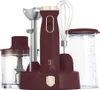 A set of kitchen appliances including an immersion blender, whisk, chopper, and measuring cup, arranged on a charging base. Anteprima dell’immagine prodotto