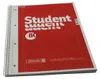 A red spiral-bound notebook with white grid lines and text on the cover. Náhľad obrázku produktu