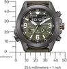A close-up, front-facing shot of a Citizen Promaster watch with a green dial and a gray case, placed on a white background with a ruler for scale. The watch face displays the time, date, and other indicators. Podgląd zdjęcia produktu