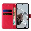 A red flip phone case is open, showing card slots and a banknote. A smartphone is in the case. Produktbild-Vorschau