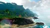 A tropical island landscape with mountains, palm trees, and the ocean. Produktbild-Vorschau