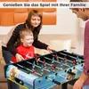 A family playing foosball indoors. Náhľad obrázku produktu
