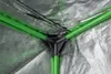 Close-up view of the interior corner of a grow tent, showing the green support poles connecting to a black plastic joint. Produktbild-Vorschau