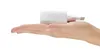 A white Xiaomi 65W fast charger is resting on an open palm. Anteprima dell’immagine prodotto