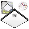A square black LED ceiling lamp with a white diffuser, shown with its packaging and internal components. Náhľad obrázku produktu