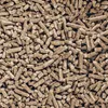 A close-up, overhead view of a pile of wood pellets. Produktbild-Vorschau