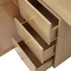 Close-up view of wooden drawers with gold knobs on a piece of furniture. Podgląd zdjęcia produktu