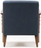 The back of a blue upholstered armchair with wooden legs. Produktbild-Vorschau