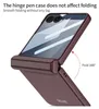 A close-up, angled view of a purple flip phone case, shown partially open to demonstrate its folding capability and hinge. Produktbild-Vorschau
