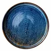 A top-down view of a single, flat, round plate with a dark blue speckled glaze and a brown rim. Produktbild-Vorschau