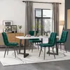 A dining table and four chairs set up in a dining room. Produktbild-Vorschau