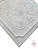 A close-up, angled view of a textured, light-colored panel with a decorative border, presented on a white background. Anteprima dell’immagine prodotto