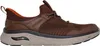 A side view of a single brown athletic shoe. Podgląd zdjęcia produktu