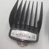 A close-up view of a Wahl brand hair clipper attachment comb. Produktbild-Vorschau