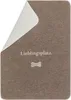 A brown pet blanket with a corner folded back to reveal a white underside. Text and a bone graphic are printed on the blanket. Produktbild-Vorschau