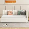 A beige daybed with three decorative pillows is shown in a room with paneled walls and a painting above. Podgląd zdjęcia produktu