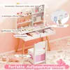 A child's vanity set with a chair and accessories, set against a pink background. Produktbild-Vorschau