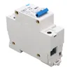 A close-up studio shot of a white and blue electrical circuit breaker mounted on a DIN rail. Anteprima dell’immagine prodotto