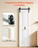 A white barn-style sliding door is shown, with close-up insets highlighting its stability features and material. Voir les images du produit