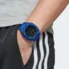 A person wearing an Adidas watch and tracksuit. Náhled obrázku produktu