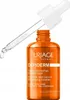 A bottle of Uriage Dépiderm serum with a dropper. Anteprima dell’immagine prodotto