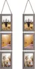 Two vertical photo frame arrangements hanging against a white background. Produktbild-Vorschau