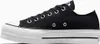 A side view of a black Converse Chuck Taylor All Star Lift Ox sneaker with a white platform sole. Voir les images du produit