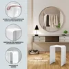 A white acrylic stool is shown in a modern bathroom or dressing area, with text highlighting its features. Produktbild-Vorschau