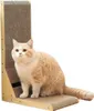 A cat sits on a corner cat scratching post. Voir les images du produit