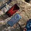 Two smartphones are placed on a rocky surface next to a backpack strap. Anteprima dell’immagine prodotto