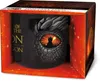 A mug with a dragon eye design is displayed in its retail packaging. Produktbild-Vorschau