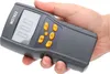 A hand holds a portable grain moisture meter. Anteprima dell’immagine prodotto