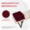 A close-up view of a folded burgundy fabric item placed on a beige surface, with text overlays highlighting material quality. Produktbild-Vorschau