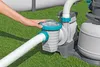 A hand is shown adjusting the lid of a pool pump filter connected to a hose, with artificial grass in the background. Produktbild-Vorschau
