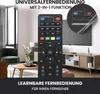 A remote control is shown in the foreground, with a living room scene including a TV and furniture in the background. Produktbild-Vorschau