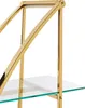 A close-up view of a gold-colored metal shelf frame with a glass shelf. Náhľad obrázku produktu