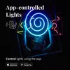 A person is holding up a glowing spiral light. Produktbild-Vorschau