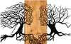 A black metal wall art depicting two tree-like profiles facing each other, with roots intertwined, mounted on a wooden background. Produktbild-Vorschau