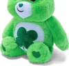 A close-up shot of a green stuffed bear with a shamrock on its belly. Produktbild-Vorschau
