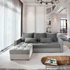 A modern living room with a sectional sofa and a coffee table. Produktbild-Vorschau
