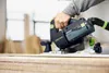 A person is using a Festool circular saw to cut a piece of wood in a workshop setting. Anteprima dell’immagine prodotto