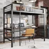 A loft bed with a desk and shelves underneath, set up in a room with brick and grey tiled walls. Podgląd zdjęcia produktu