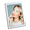 A silver and white photo frame with a picture of a woman inside, set against a light gray background. Produktbild-Vorschau