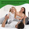 A family is playing on a bed, with a young girl sitting on her father's chest. Produktbild-Vorschau