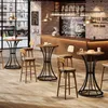 A modern coffee shop interior with high tables and bar stools. Produktbild-Vorschau