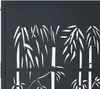 A black metal gate with a white bamboo design cut out. Produktbild-Vorschau