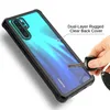 A hand is holding keys near a phone case on a Huawei P30 Pro phone. Produktbild-Vorschau